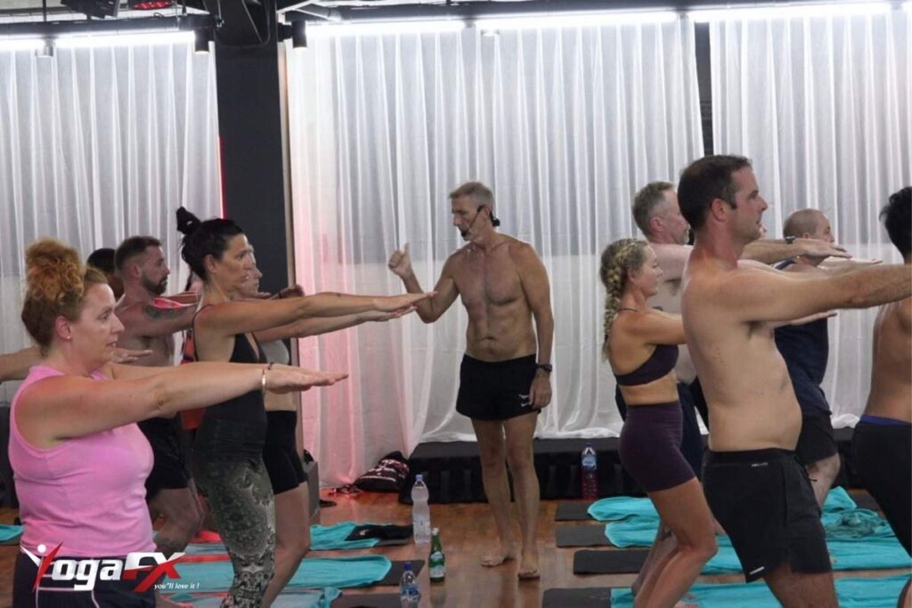 Self-paced online bikram yoga teacher training coursework screen showing 26-posture theory and anatomy modules.