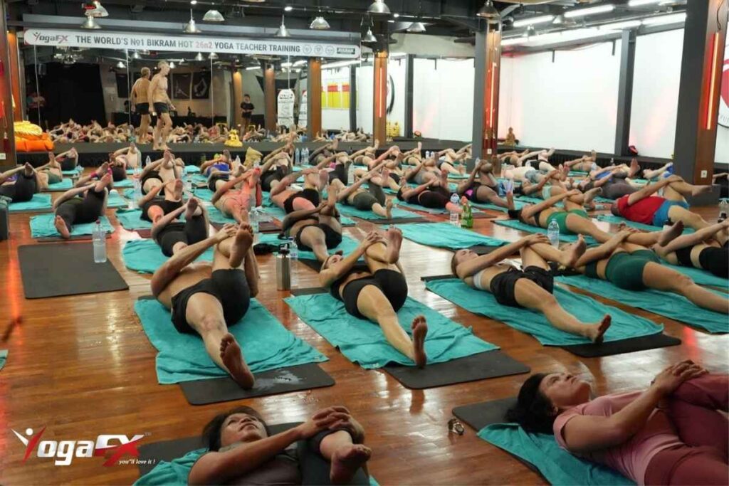 A beginner attending two to three Bikram yoga classes a week to build heat tolerance