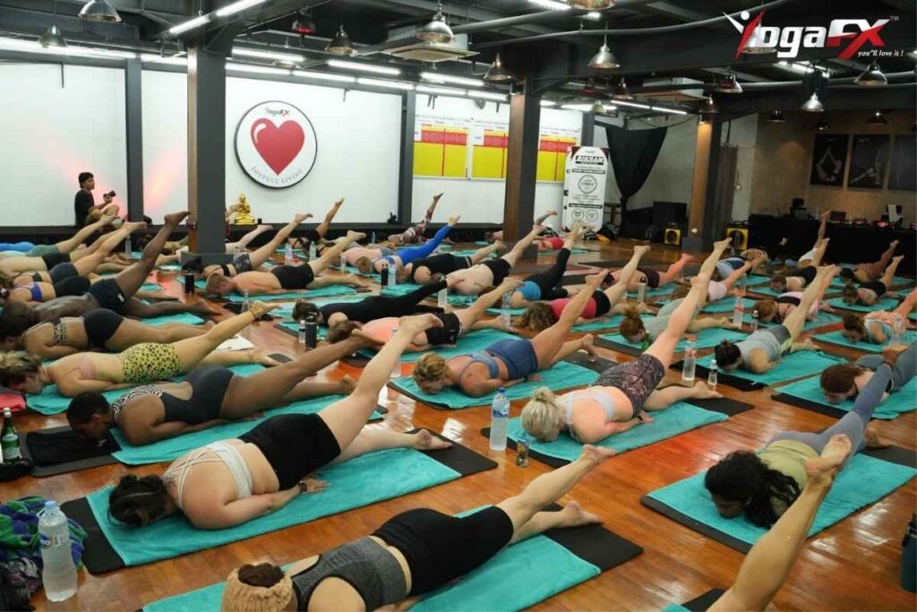 An open-air vinyasa retreat setting typical of Bali's outer island yoga scene