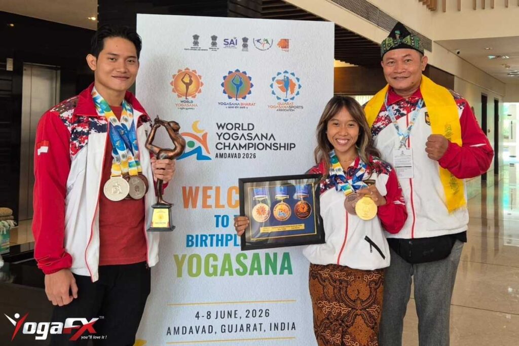 Ms. Ivara Candra Kartika, YogaFX Bali Seminyak studio hot yoga instructor and World Yogasana Sport Championship gold and bronze medalist, teaching class
